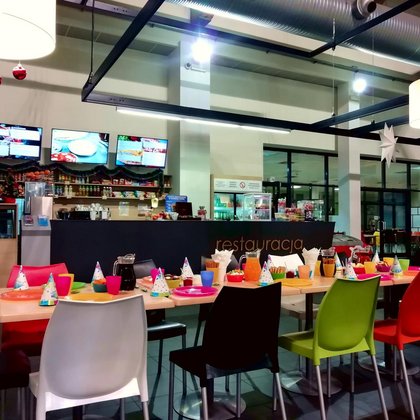 A table at the Restaurant in hall with colorful table setting.